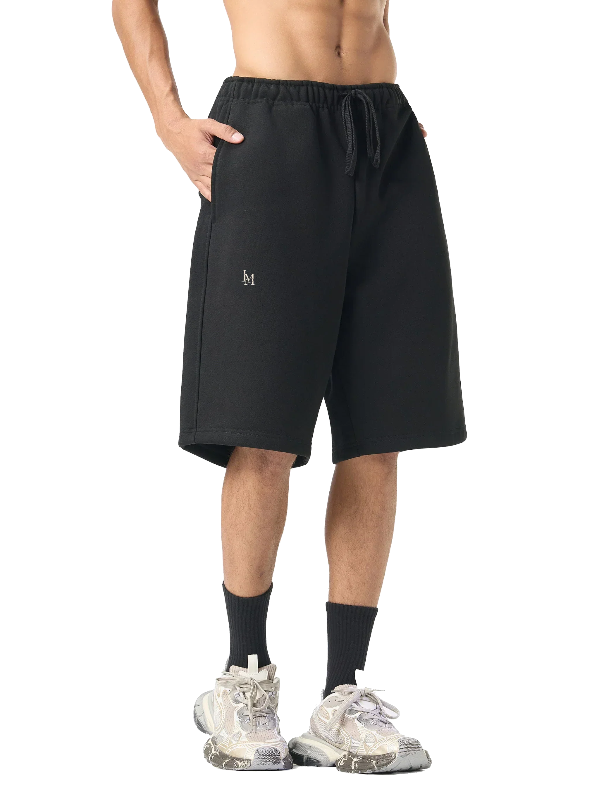 The Fleece Short in Black — on model, front #Color_Black