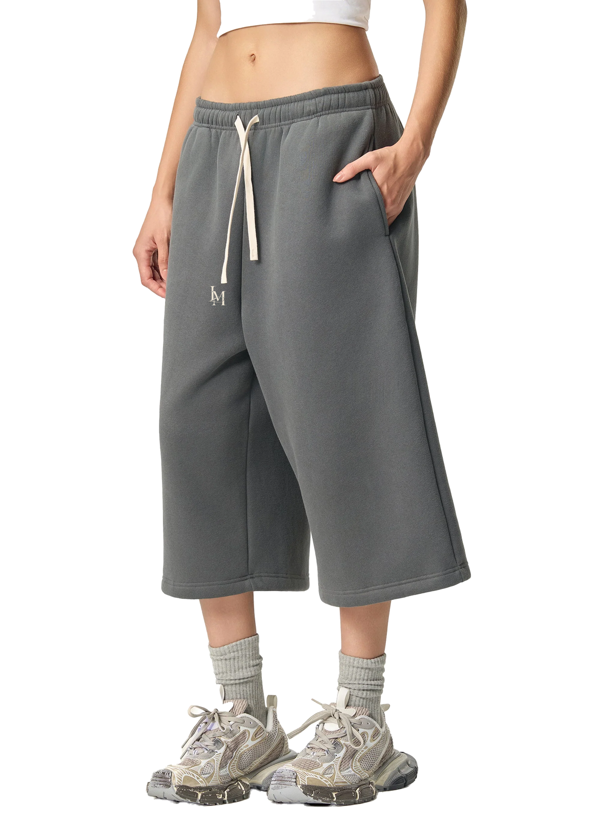 The Three-Quarter Sweatpant in Charcoal Gray — on model, front #Color_Charcoal Gray