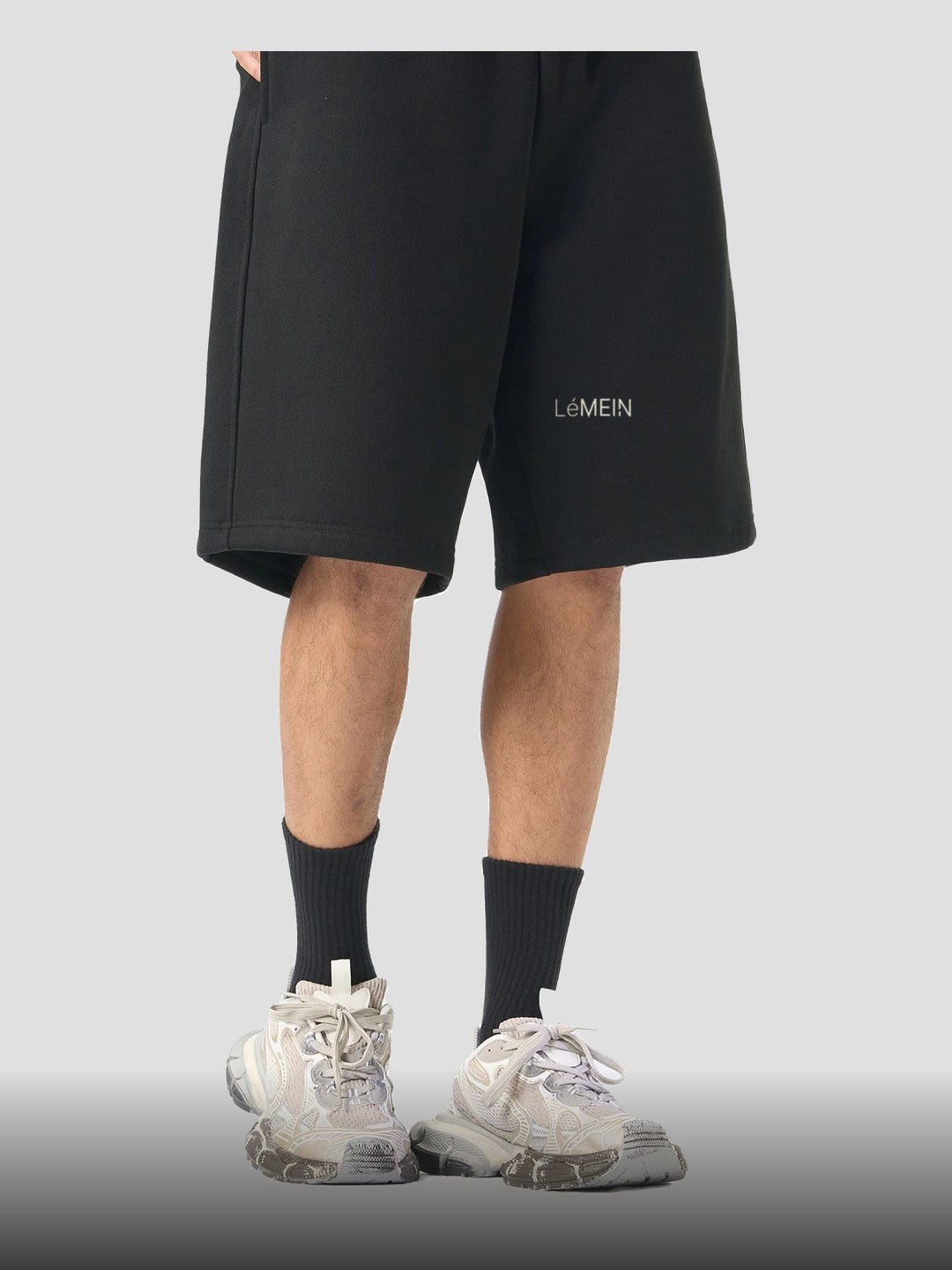 LÉMEIN — the fleece short, on model