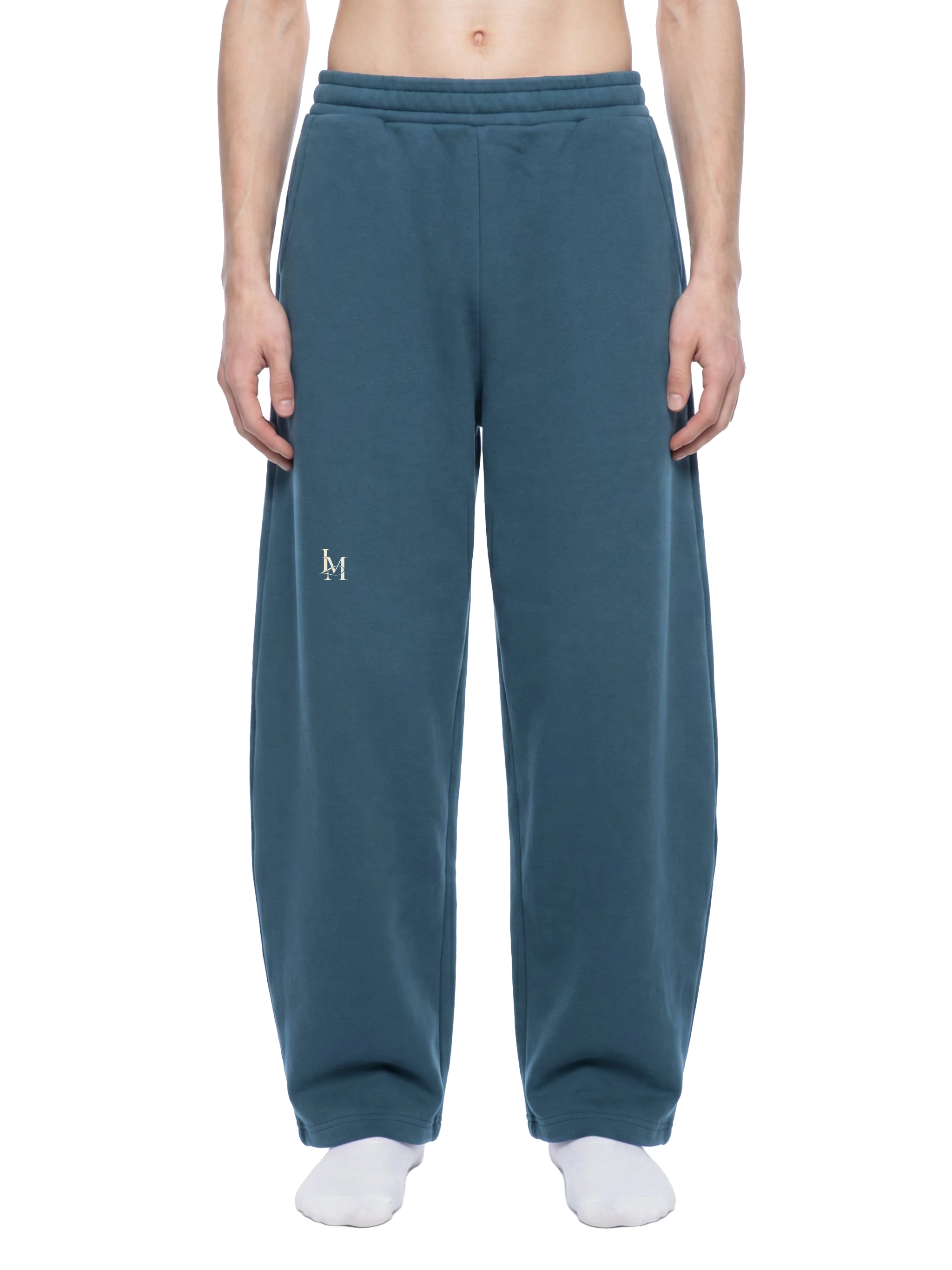 The Barrel Sweatpant in Navy Blue — on model, front #Color_Navy Blue