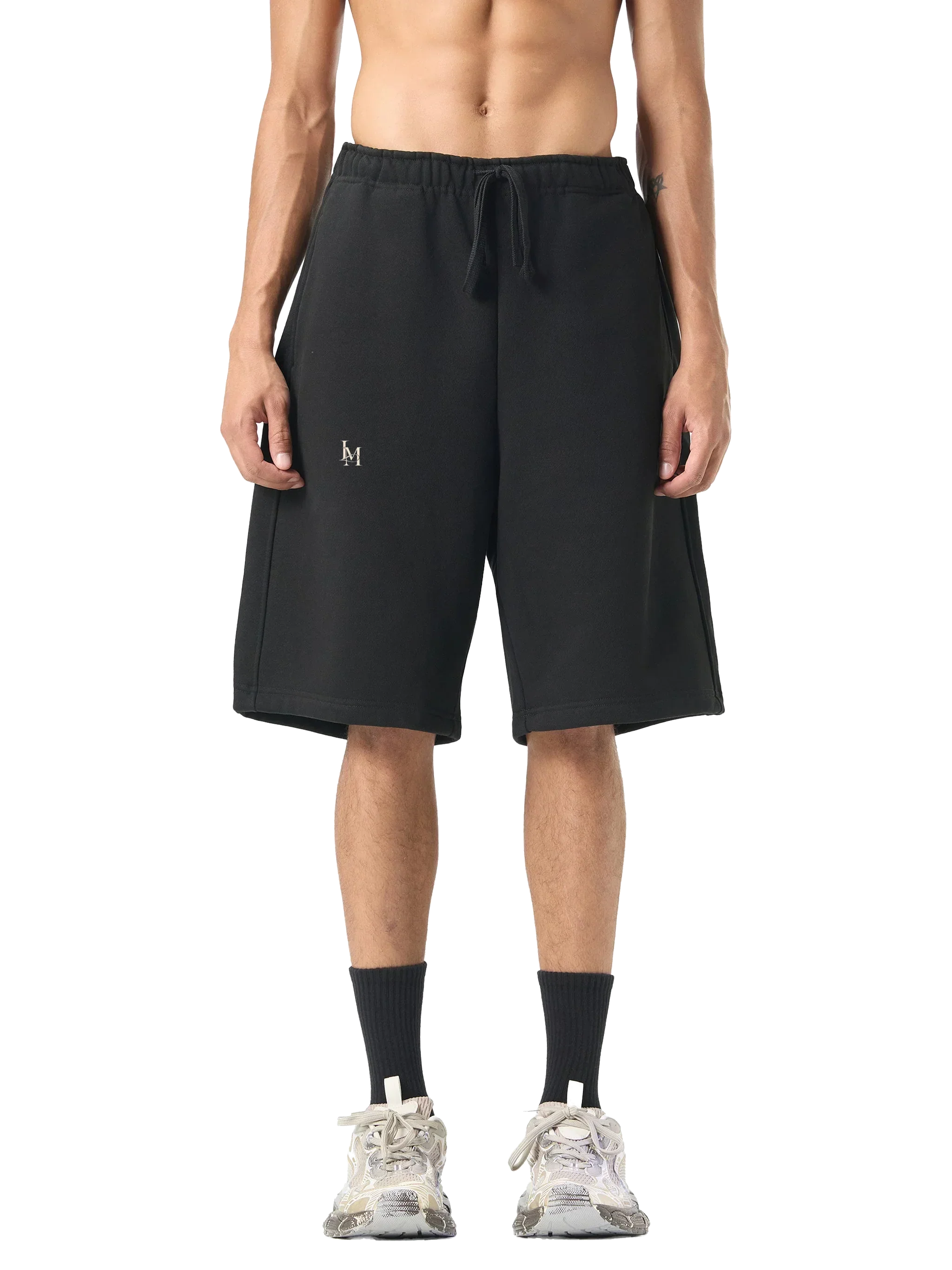 The Fleece Short in Black — on model, front #Color_Black