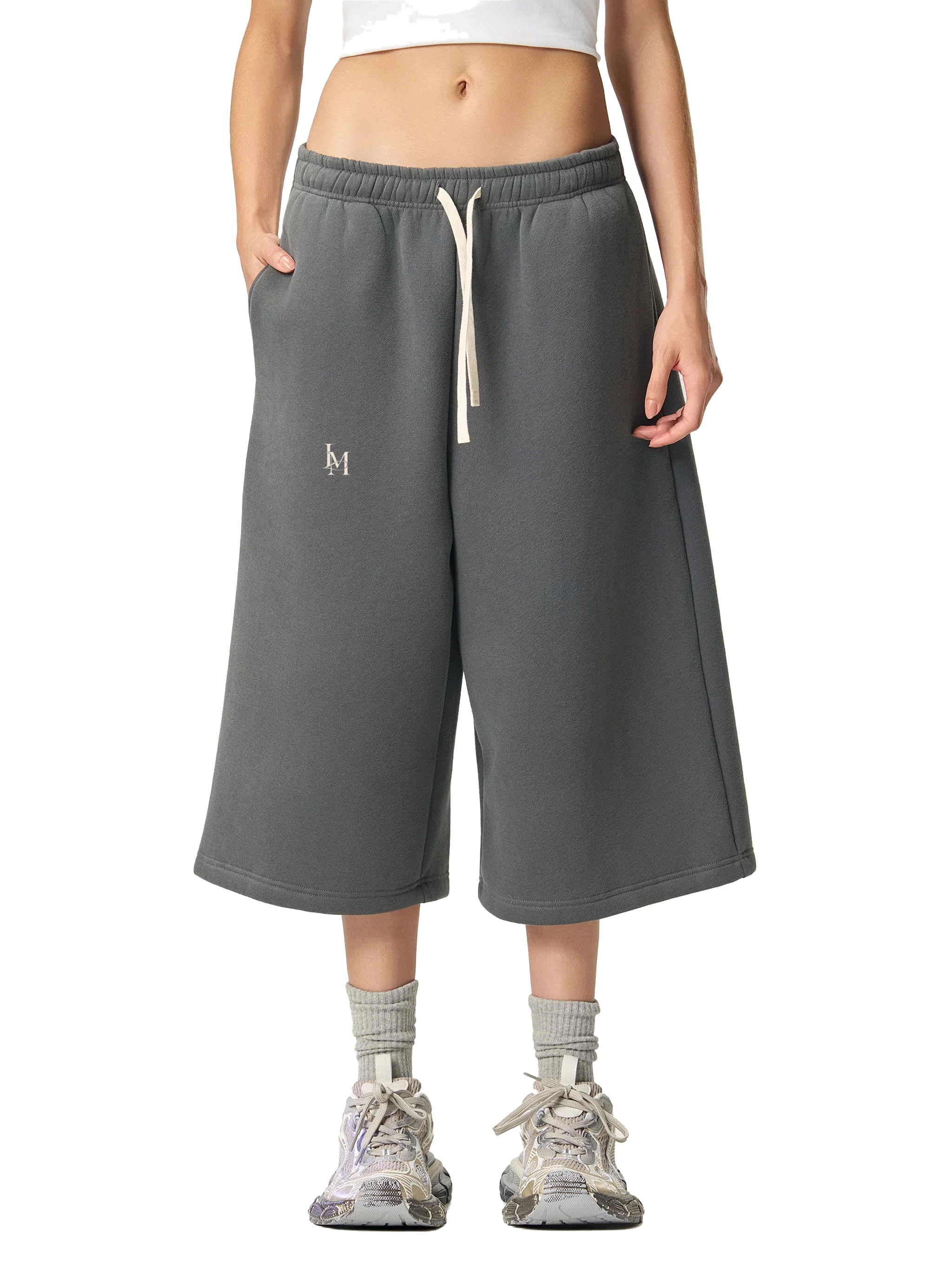 The Three-Quarter Sweatpant in Charcoal Gray — on model, front #Color_Charcoal Gray