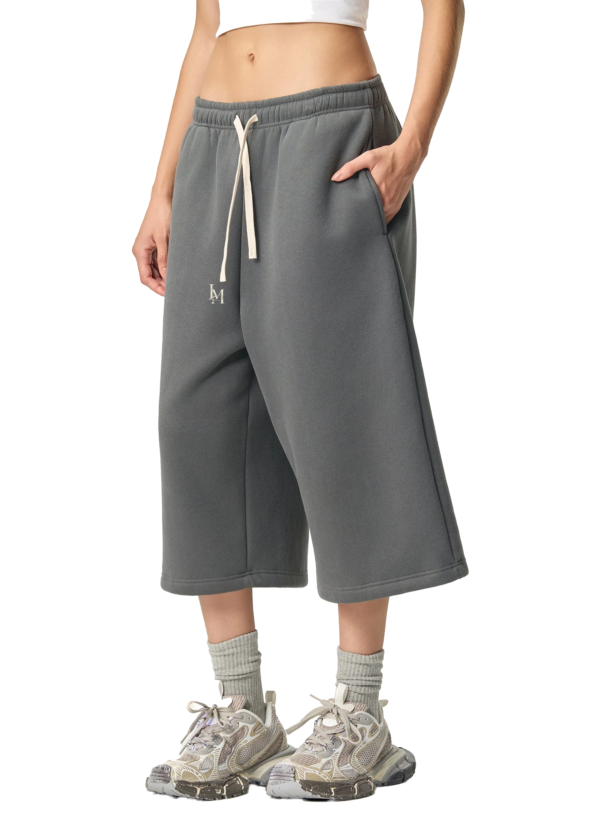 The Three-Quarter Sweatpant in Charcoal Gray — on model, front #Color_Charcoal Gray